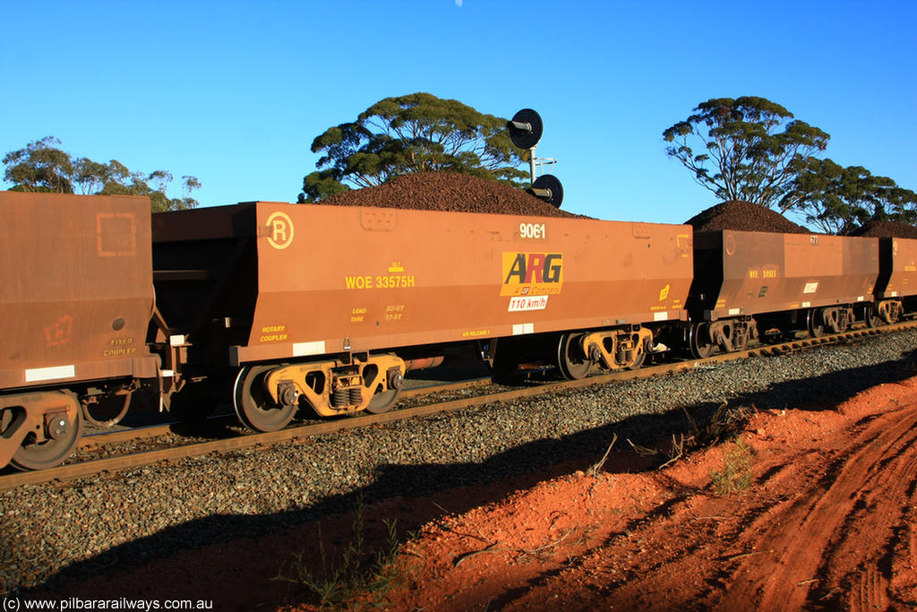 100731 02274
WOE type iron ore waggon WOE 33575 is one of a batch of one hundred and twenty eight built by United Group Rail WA between August 2008 and March 2009 with serial number 950211-115 and fleet number 9061 for Koolyanobbing iron ore operations, on loaded train 6413 at Binduli Triangle, 31st July 2010.
Keywords: WOE-type;WOE33575;United-Group-Rail-WA;950211-115;