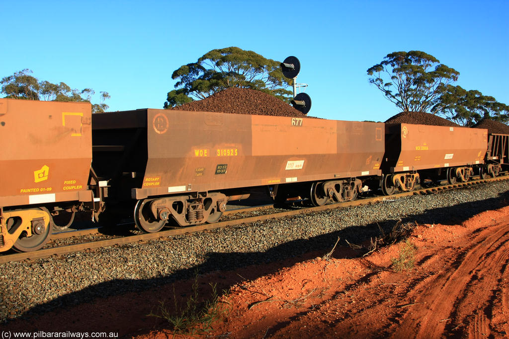 100731 02275
WOE type iron ore waggon WOE 31092 is one of a batch of one hundred and thirty built by Goninan WA between March and August 2001 with serial number 950092-082 and fleet number 677 for Koolyanobbing iron ore operations, on loaded train 6413 at Binduli Triangle, 31st July 2010.
Keywords: WOE-type;WOE31092;Goninan-WA;950092-082;