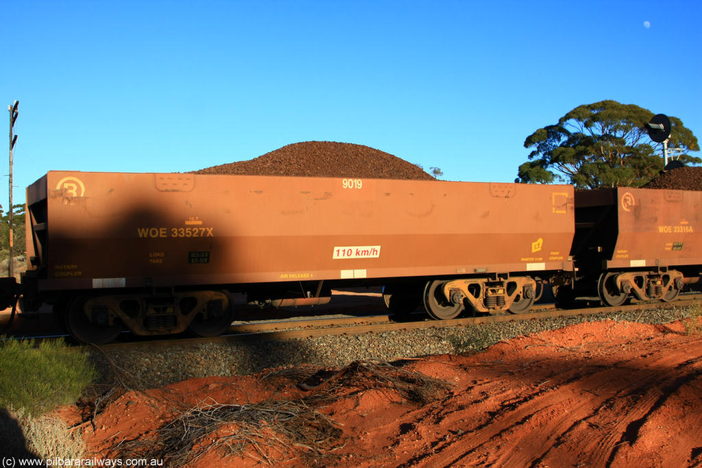 100731 02284
WOE type iron ore waggon WOE 33527 is one of a batch of one hundred and twenty eight built by United Group Rail WA between August 2008 and March 2009 with serial number 950211-067 and fleet number 9019 for Koolyanobbing iron ore operations, on loaded train 6413 at Binduli Triangle, 31st July 2010.
Keywords: WOE-type;WOE33527;United-Group-Rail-WA;950211-067;