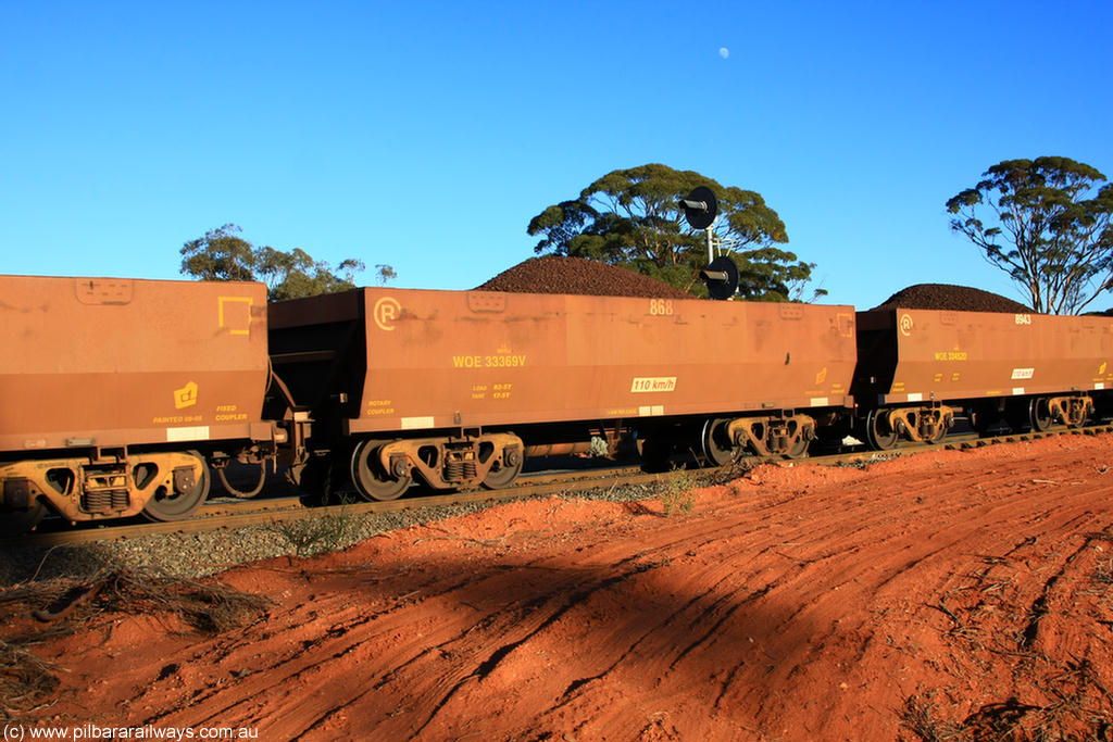 100731 02297
WOE type iron ore waggon WOE 33369 is one of a batch of one hundred and forty one built by United Goninan WA between November 2005 and April 2006 with serial number 950142-074 and fleet number 868 for Koolyanobbing iron ore operations, on loaded train 6413 at Binduli Triangle, 31st July 2010.
Keywords: WOE-type;WOE33369;United-Goninan-WA;950142-074;