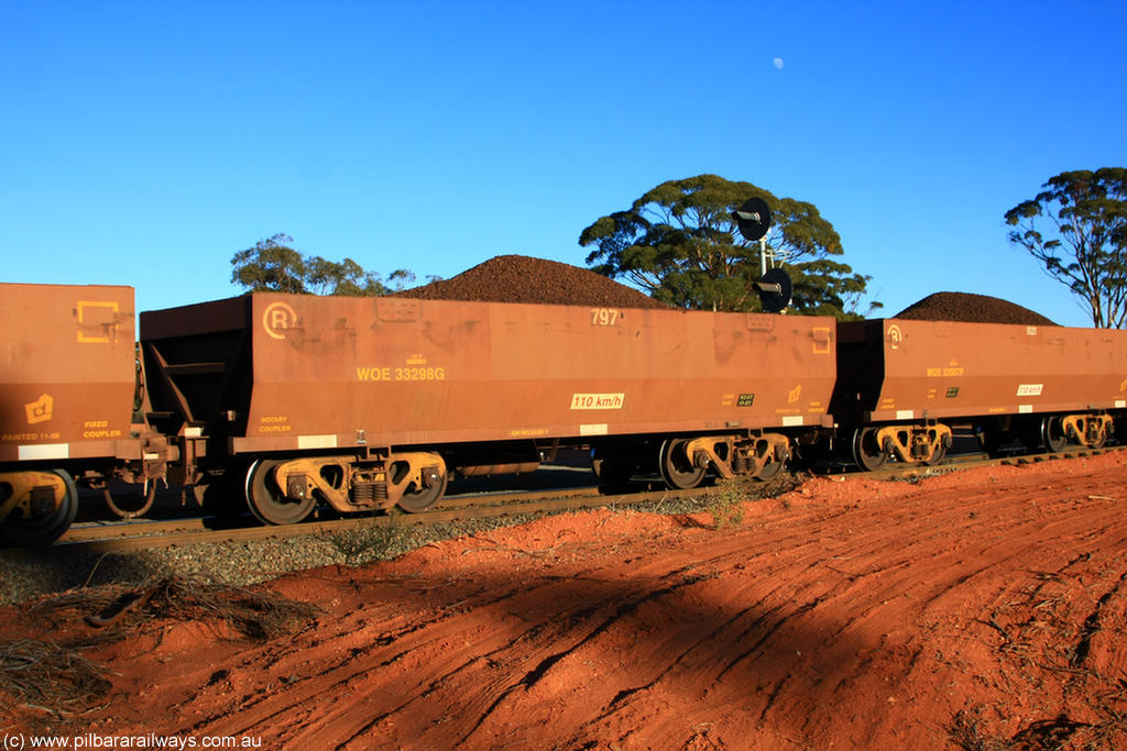 100731 02306
WOE type iron ore waggon WOE 33298 is one of a batch of one hundred and forty one built by United Goninan WA between November 2005 and April 2006 with serial number 950142-003 and fleet number 797 for Koolyanobbing iron ore operations, on loaded train 6413 at Binduli Triangle, 31st July 2010.
Keywords: WOE-type;WOE33298;United-Goninan-WA;950142-003;