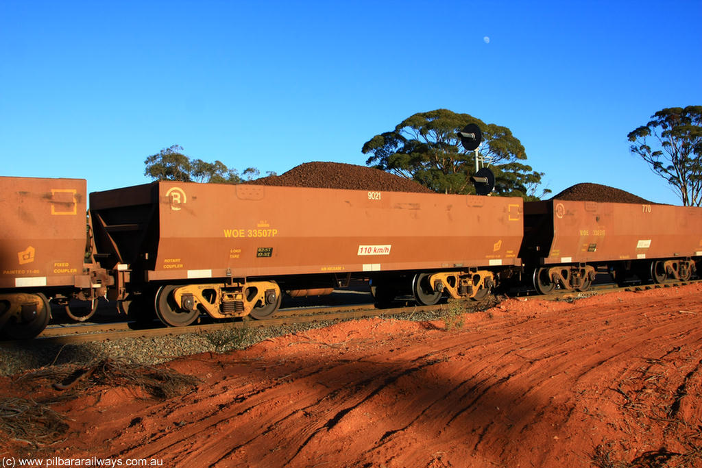 100731 02307
WOE type iron ore waggon WOE 33507 is one of a batch of one hundred and twenty eight built by United Group Rail WA between August 2008 and March 2009 with serial number 950211-047 and fleet number 9021 for Koolyanobbing iron ore operations, on loaded train 6413 at Binduli Triangle, 31st July 2010.
Keywords: WOE-type;WOE33507;United-Group-Rail-WA;950211-047;