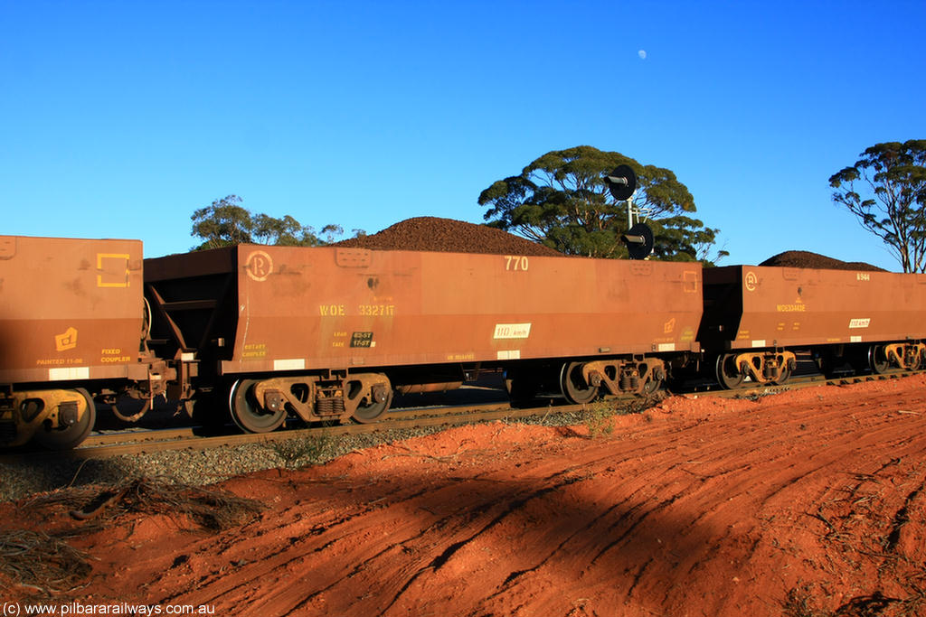 100731 02308
WOE type iron ore waggon WOE 33271 is one of a batch of thirty five built by Goninan WA between January and April 2005 with serial number 950104-011 and fleet number 770 for Koolyanobbing iron ore operations, on loaded train 6413 at Binduli Triangle, 31st July 2010.
Keywords: WOE-type;WOE33271;Goninan-WA;950104-011;
