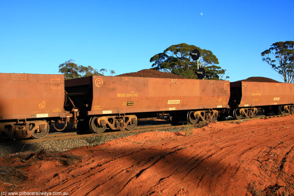 100731 02311
WOE type iron ore waggon WOE 33323 is one of a batch of one hundred and forty one built by United Goninan WA between November 2005 and April 2006 with serial number 950142-028 and fleet number 822 for Koolyanobbing iron ore operations, on loaded train 6413 at Binduli Triangle, 31st July 2010.
Keywords: WOE-type;WOE33323;United-Goninan-WA;950142-028;