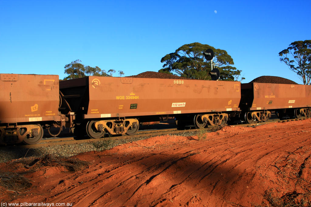 100731 02317
WOE type iron ore waggon WOE 33494 is one of a batch of one hundred and twenty eight built by United Group Rail WA between August 2008 and March 2009 with serial number 950211-034 and fleet number 9000 for Koolyanobbing iron ore operations, on loaded train 6413 at Binduli Triangle, 31st July 2010.
Keywords: WOE-type;WOE33494;United-Group-Rail-WA;950211-034;