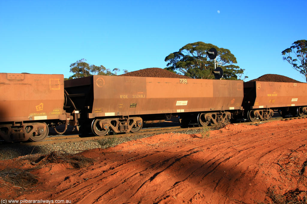 100731 02334
WOE type iron ore waggon WOE 33240 is one of a batch of twenty seven built by Goninan WA between September and October 2002 with serial number 950103-007 and fleet number 739 for Koolyanobbing iron ore operations, on loaded train 6413 at Binduli Triangle, 31st July 2010.
Keywords: WOE-type;WOE33240;Goninan-WA;950103-007;