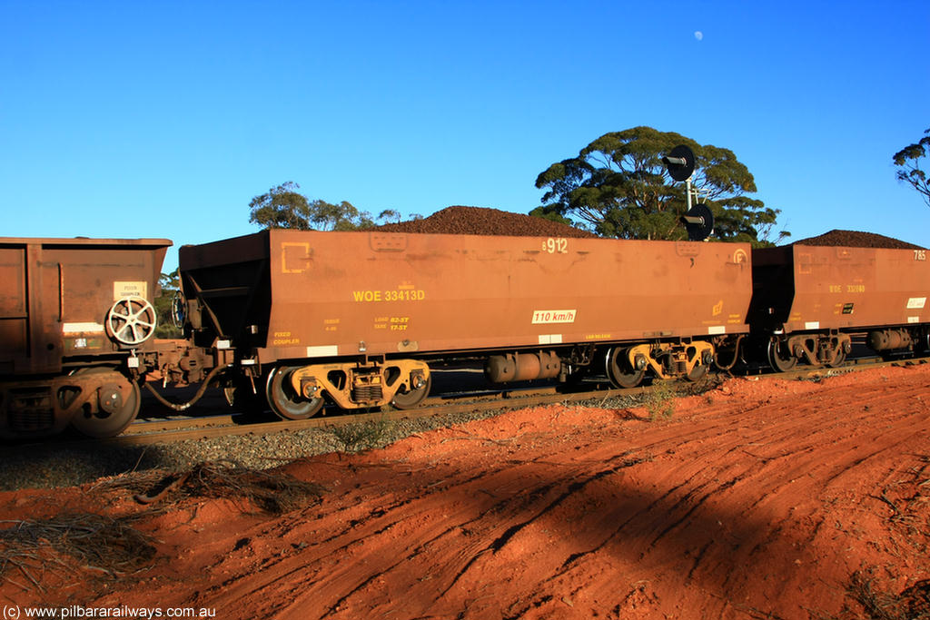 100731 02337
WOE type iron ore waggon WOE 33413 is one of a batch of one hundred and forty one built by United Group Rail WA between November 2005 and April 2006 with serial number 950142-118 and fleet number 8912 for Koolyanobbing iron ore operations, on loaded train 6413 at Binduli Triangle, 31st July 2010.
Keywords: WOE-type;WOE33413;United-Group-Rail-WA;950142-118;