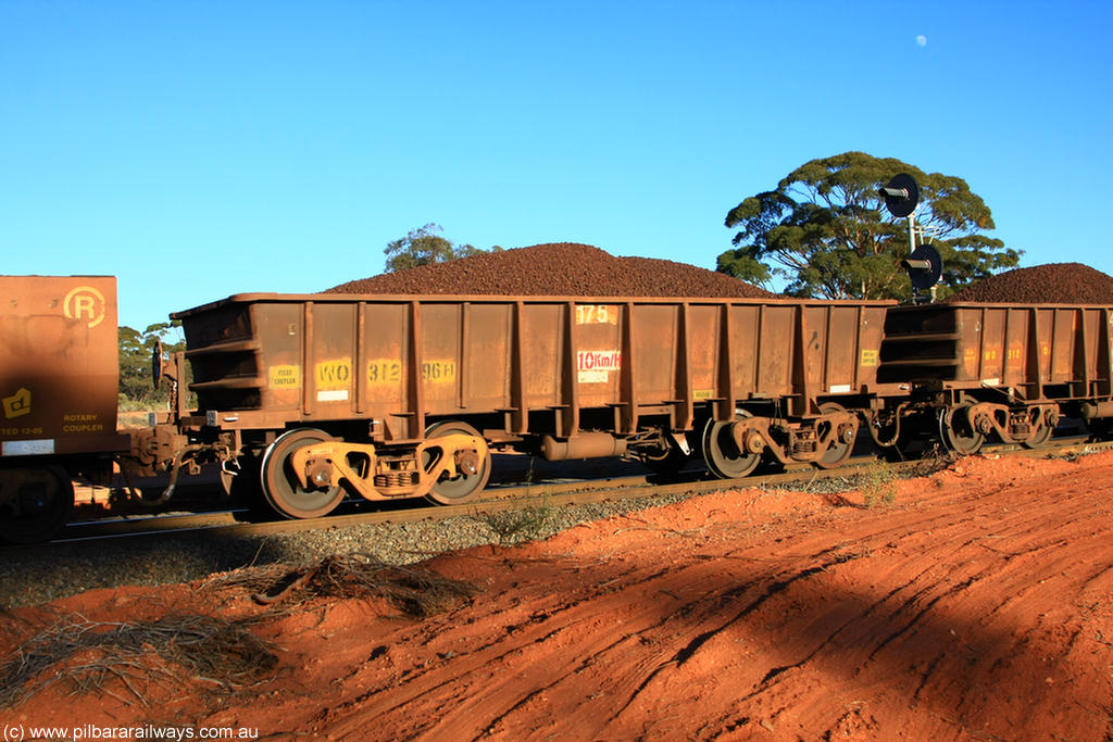 100731 02342
WO type iron ore waggon WO 31296 is one of a batch of fifteen built by WAGR Midland Workshops between July and October 1968 with fleet number 175 for Koolyanobbing iron ore operations, with a 75 ton and 1018 ft³ capacity, on loaded train 6413 at Binduli Triangle, 31st July 2010. This unit was converted to WOC for coal in 1986 till 1994 when it was re-classed back to WO.
Keywords: WO-type;WO31296;WAGR-Midland-WS;