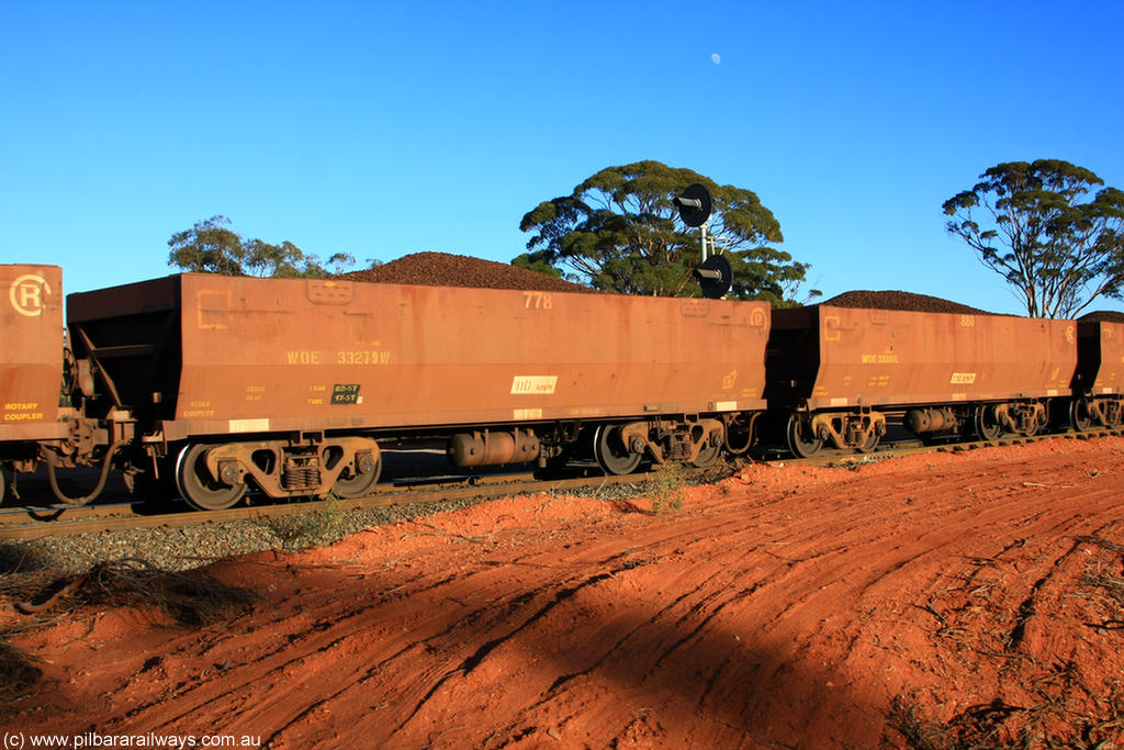 100731 02380
WOE type iron ore waggon WOE 33279 is one of a batch of thirty five built by Goninan WA between January and April 2005 with serial number 950104-019 and fleet number 778 for Koolyanobbing iron ore operations, on loaded train 6413 at Binduli Triangle, 31st July 2010.
Keywords: WOE-type;WOE33279;Goninan-WA;950104-019;