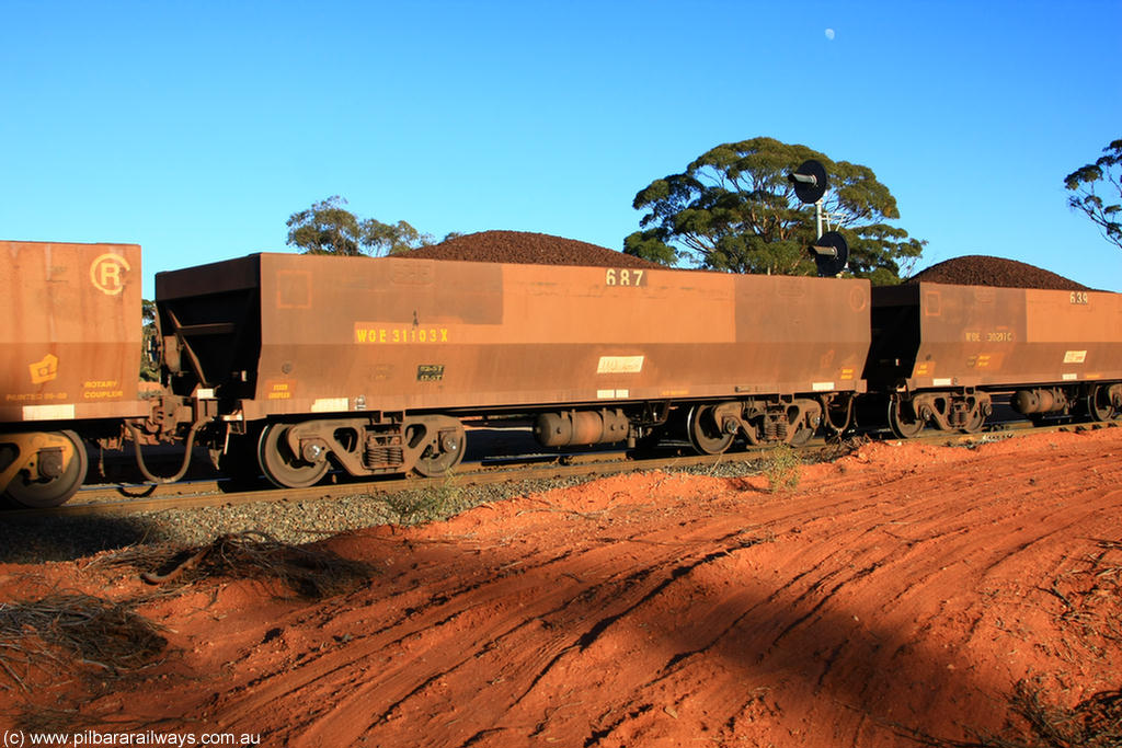 100731 02388
WOE type iron ore waggon WOE 31103 is one of a batch of one hundred and thirty built by Goninan WA between March and August 2001 with serial number 950092-093 and fleet number 687 for Koolyanobbing iron ore operations, on loaded train 6413 at Binduli Triangle, 31st July 2010.
Keywords: WOE-type;WOE31103;Goninan-WA;950092-093;
