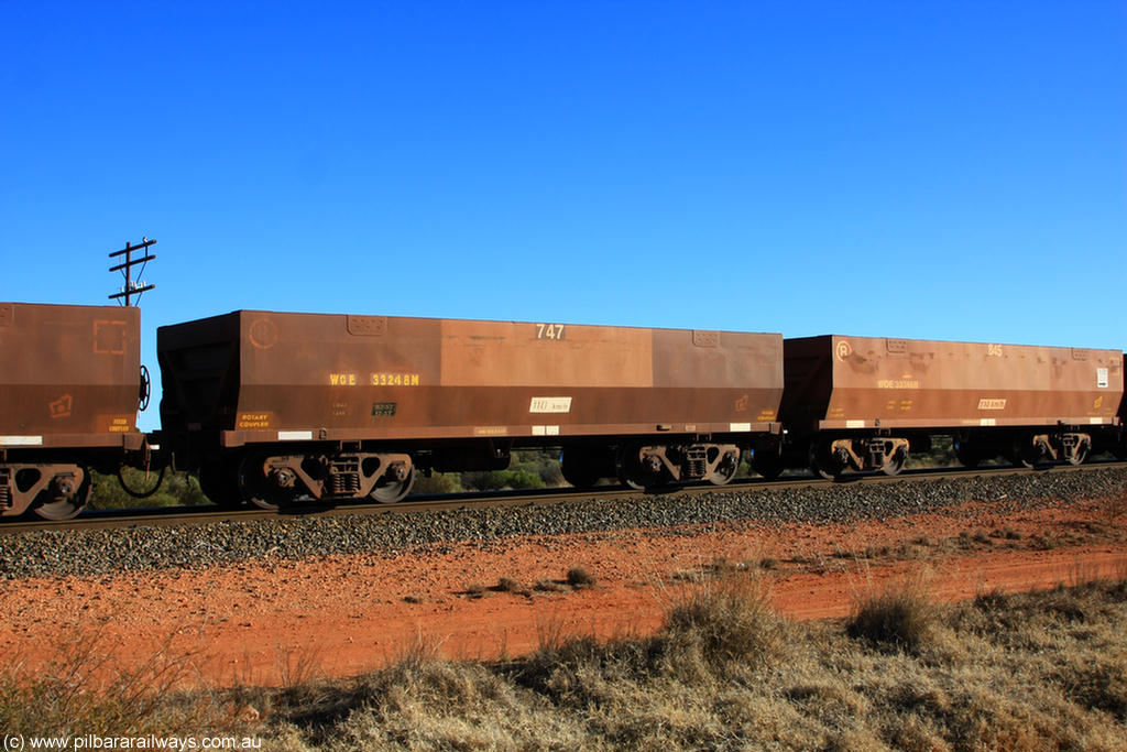 100731 02419
WOE type iron ore waggon WOE 33248 is one of a batch of twenty seven built by Goninan WA between September and October 2002 with serial number 950103-015 and fleet number 747 for Koolyanobbing iron ore operations, on empty train 6418 at Binduli Triangle, 31st July 2010.
Keywords: WOE-type;WOE33248;Goninan-WA;950103-015;