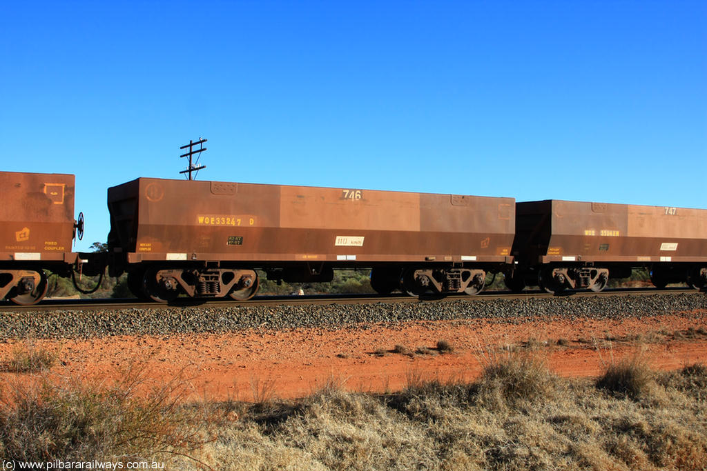 100731 02420
WOE type iron ore waggon WOE 33247 is one of a batch of twenty seven built by Goninan WA between September and October 2002 with serial number 950103-014 and fleet number 746 for Koolyanobbing iron ore operations, on empty train 6418 at Binduli Triangle, 31st July 2010.
Keywords: WOE-type;WOE33247;Goninan-WA;950103-014;