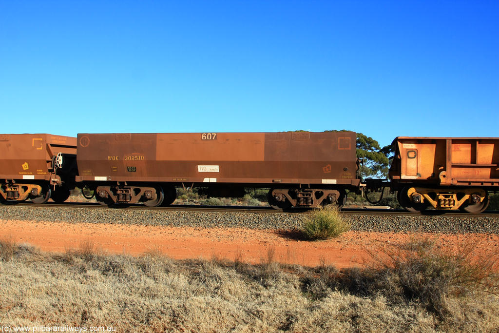 100731 02427
WOE type iron ore waggon WOE 30257 is one of a batch of one hundred and thirty built by Goninan WA between March and August 2001 with serial number 950092-007 and fleet number 607 for Koolyanobbing iron ore operations, on empty train 6418 at Binduli Triangle, 31st July 2010.
Keywords: WOE-type;WOE30257;Goninan-WA;950092-007;
