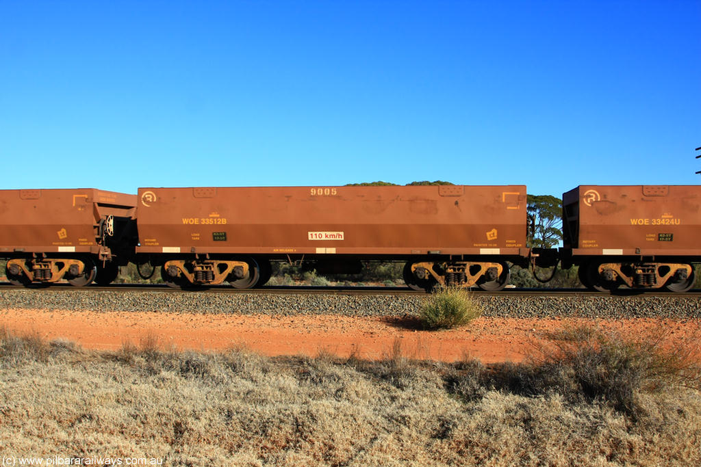 100731 02445
WOE type iron ore waggon WOE 33512 is one of a batch of one hundred and twenty eight built by United Group Rail WA between August 2008 and March 2009 with serial number 950211-052 and fleet number 9005 for Koolyanobbing iron ore operations, on empty train 6418 at Binduli Triangle, 31st July 2010.
Keywords: WOE-type;WOE33512;United-Group-Rail-WA;950211-052;