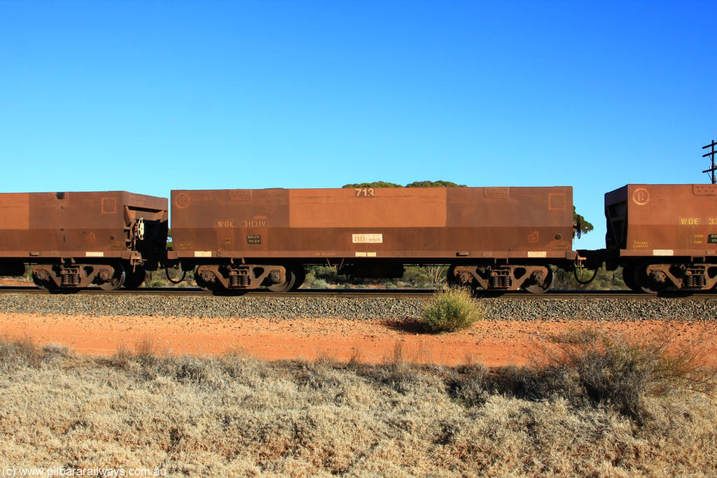 100731 02463
WOE type iron ore waggon WOE 31131 is one of a batch of one hundred and thirty built by Goninan WA between March and August 2001 with serial number 950092-121 and fleet number 713 for Koolyanobbing iron ore operations, on empty train 6418 at Binduli Triangle, 31st July 2010.
Keywords: WOE-type;WOE31131;Goninan-WA;950092-121;