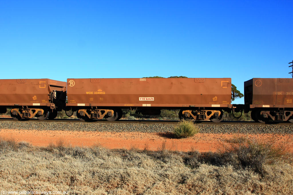 100731 02466
WOE type iron ore waggon WOE 33495 is one of a batch of one hundred and twenty eight built by United Group Rail WA between August 2008 and March 2009 with serial number 950211-035 and fleet number 8985 for Koolyanobbing iron ore operations, on empty train 6418 at Binduli Triangle, 31st July 2010.
Keywords: WOE-type;WOE33495;United-Group-Rail-WA;950211-035;