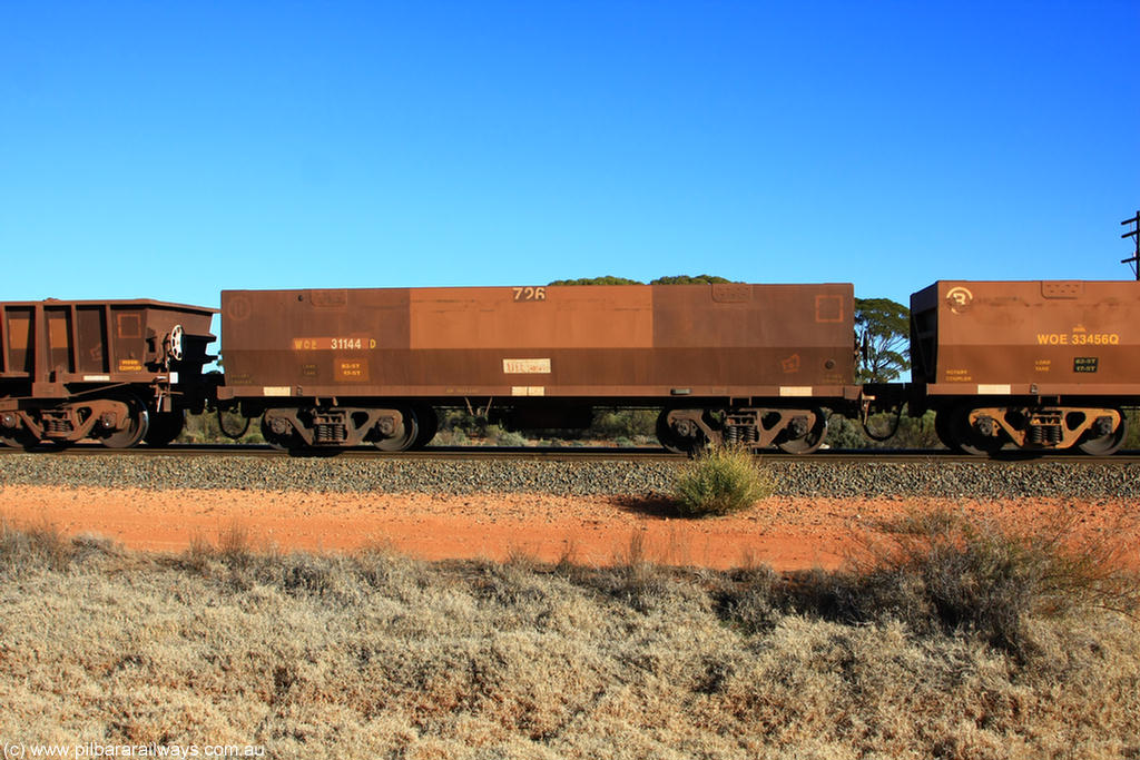 100731 02479
WOE type iron ore waggon WOE 31144 is one of a batch of fifteen built by Goninan WA between April and May 2002 with fleet number 726 for Koolyanobbing iron ore operations, on empty train 6418 at Binduli Triangle, 31st July 2010.
Keywords: WOE-type;WOE31144;Goninan-WA;