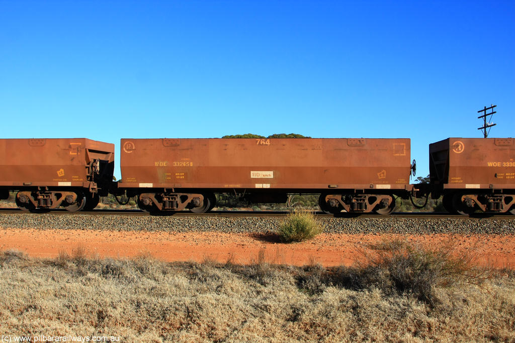 100731 02491
WOE type iron ore waggon WOE 33265 is one of a batch of thirty five built by Goninan WA between January and April 2005 with serial number 950104-005 and fleet number 764 for Koolyanobbing iron ore operations, on empty train 6418 at Binduli Triangle, 31st July 2010.
Keywords: WOE-type;WOE33265;Goninan-WA;950104-005;