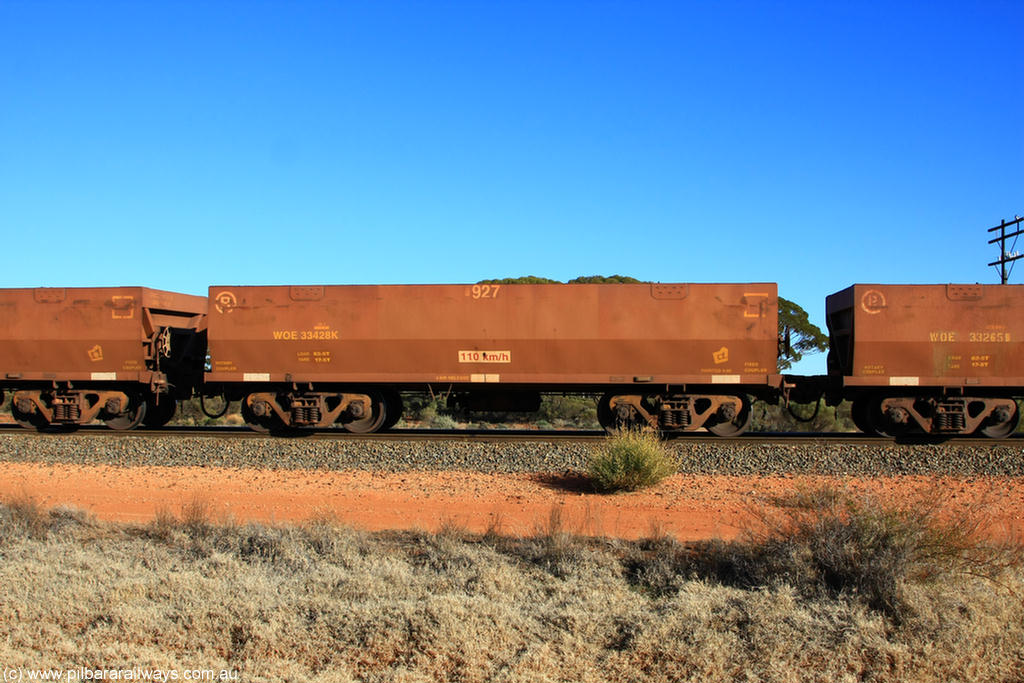 100731 02492
WOE type iron ore waggon WOE 33428 is one of a batch of one hundred and forty one built by United Group Rail WA between November 2005 and April 2006 with serial number 950142-133 and fleet number 8927 for Koolyanobbing iron ore operations, on empty train 6418 at Binduli Triangle, 31st July 2010.
Keywords: WOE-type;WOE33428;United-Group-Rail-WA;950142-133;