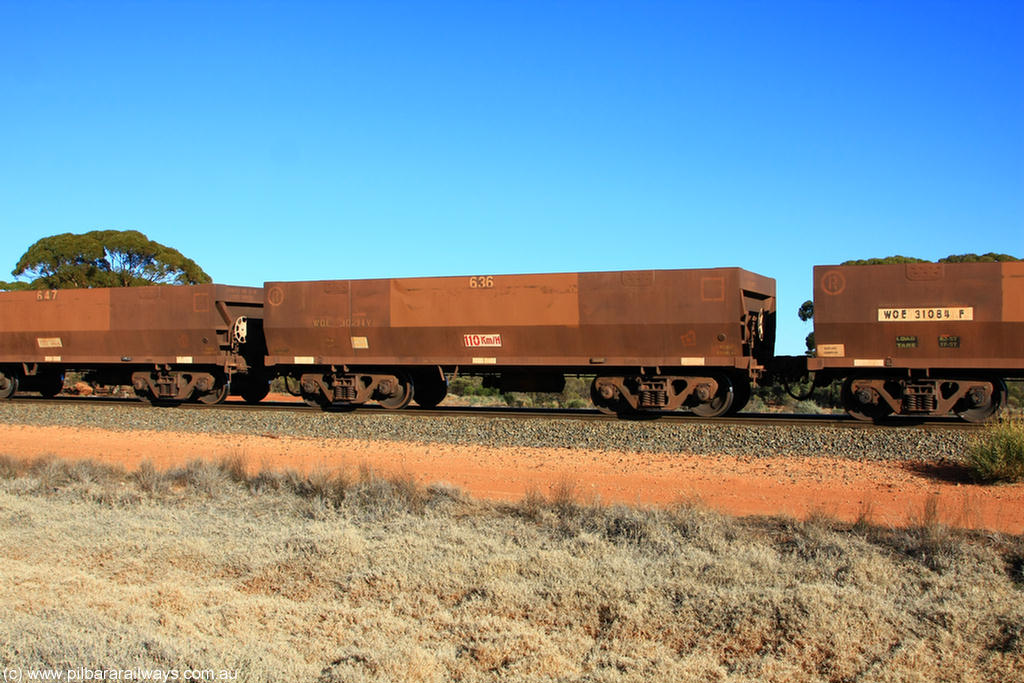 100731 02501
WOE type iron ore waggon WOE 30294 is one of a batch of one hundred and thirty built by Goninan WA between March and August 2001 with serial number 950092-044 and fleet number 636 for Koolyanobbing iron ore operations, on empty train 6418 at Binduli Triangle, 31st July 2010.
Keywords: WOE-type;WOE30294;Goninan-WA;950092-044;
