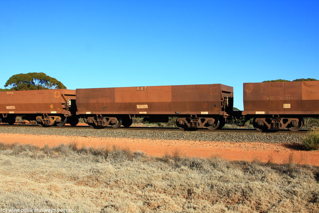 100731 02502
WOE type iron ore waggon WOE 31061 is one of a batch of one hundred and thirty built by Goninan WA between March and August 2001 with serial number 950092-051 and fleet number 647 for Koolyanobbing iron ore operations, on empty train 6418 at Binduli Triangle, 31st July 2010.
Keywords: WOE-type;WOE31061;Goninan-WA;950092-051;