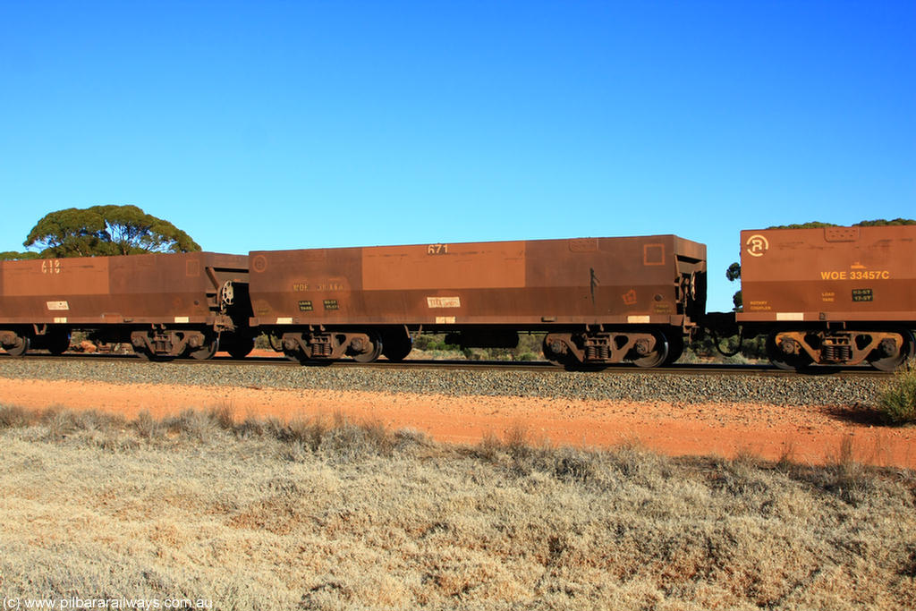 100731 02504
WOE type iron ore waggon WOE 31086 is one of a batch of one hundred and thirty built by Goninan WA between March and August 2001 with serial number 950092-076 and fleet number 671 for Koolyanobbing iron ore operations, on empty train 6418 at Binduli Triangle, 31st July 2010.
Keywords: WOE-type;WOE31086;Goninan-WA;950092-076;