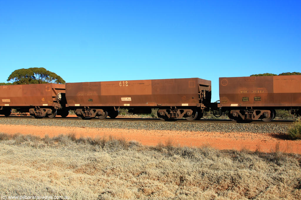 100731 02505
WOE type iron ore waggon WOE 30275 is one of a batch of one hundred and thirty built by Goninan WA between March and August 2001 with serial number 950092-025 and fleet number 618 for Koolyanobbing iron ore operations, on empty train 6418 at Binduli Triangle, 31st July 2010.
Keywords: WOE-type;WOE30275;Goninan-WA;950092-025;