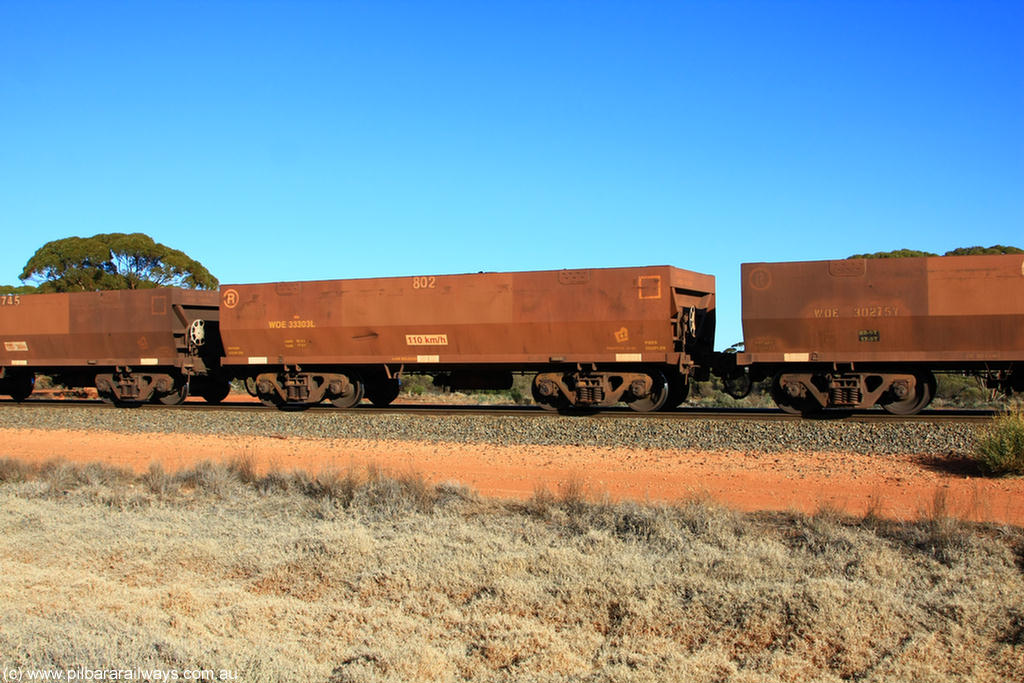 100731 02506
WOE type iron ore waggon WOE 33303 is one of a batch of one hundred and forty one built by United Goninan WA between November 2005 and April 2006 with serial number 950142-008 and fleet number 802 for Koolyanobbing iron ore operations, on empty train 6418 at Binduli Triangle, 31st July 2010.
Keywords: WOE-type;WOE33303;United-Goninan-WA;950142-008;