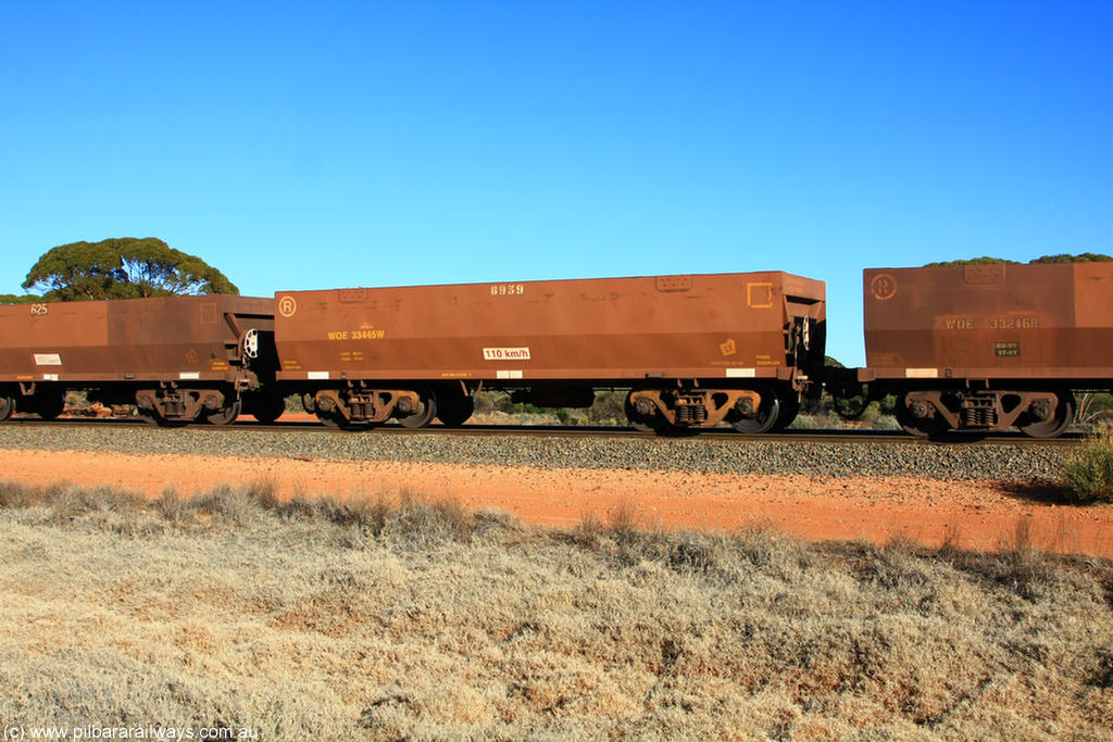 100731 02508
WOE type iron ore waggon WOE 33445 is one of a batch of seventeen built by United Group Rail WA between July and August 2008 with serial number 950209-009 and fleet number 8939 for Koolyanobbing iron ore operations, on empty train 6418 at Binduli Triangle, 31st July 2010.
Keywords: WOE-type;WOE33445;United-Group-Rail-WA;950209-009;