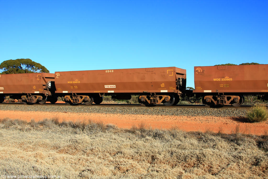 100731 02517
WOE type iron ore waggon WOE 33451 is one of a batch of seventeen built by United Group Rail WA between July and August 2008 with serial number 950209-015 and fleet number 8948 for Koolyanobbing iron ore operations, on empty train 6418 at Binduli Triangle, 31st July 2010.
Keywords: WOE-type;WOE33451;United-Group-Rail-WA;950209-015;