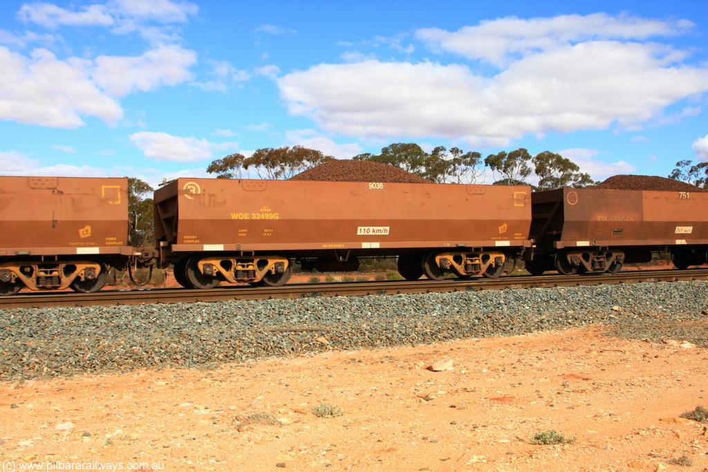 100731 02824
WOE type iron ore waggon WOE 33499 is one of a batch of one hundred and twenty eight built by United Group Rail WA between August 2008 and March 2009 with serial number 950211-039 and fleet number 9036 for Koolyanobbing iron ore operations, on loaded train 7415 at Binduli Triangle, 31st July 2010.
Keywords: WOE-type;WOE33499;United-Group-Rail-WA;950211-039;