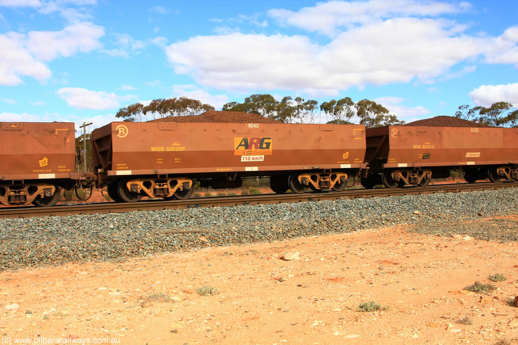 100731 02831
WOE type iron ore waggon WOE 33550 is one of a batch of one hundred and twenty eight built by United Group Rail WA between August 2008 and March 2009 with serial number 950211-090 and fleet number 9040 for Koolyanobbing iron ore operations, on loaded train 7415 at Binduli Triangle, 31st July 2010.
Keywords: WOE-type;WOE33550;United-Group-Rail-WA;950211-090;