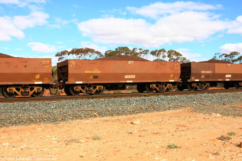 100731 02839
WOE type iron ore waggon WOE 33378 is one of a batch of one hundred and forty one built by United Goninan WA between November 2005 and April 2006 with serial number 950142-083 and fleet number 877 for Koolyanobbing iron ore operations, on loaded train 7415 at Binduli Triangle, 31st July 2010.
Keywords: WOE-type;WOE33378;United-Goninan-WA;950142-083;