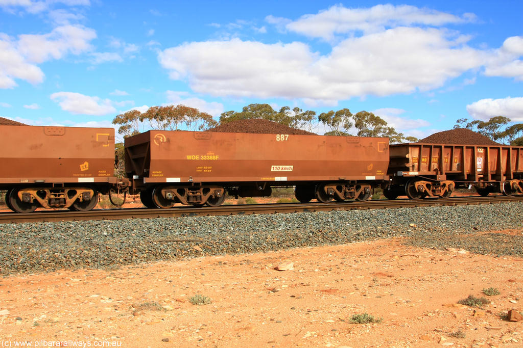 100731 02847
WOE type iron ore waggon WOE 33388 is one of a batch of one hundred and forty one built by United Group Rail WA between November 2005 and April 2006 with serial number 950142-093 and fleet number 887 for Koolyanobbing iron ore operations, on loaded train 7415 at Binduli Triangle, 31st July 2010.
Keywords: WOE-type;WOE33388;United-Group-Rail-WA;950142-093;