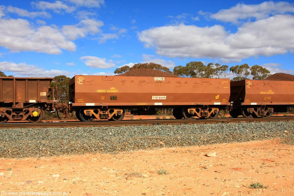 100731 02853
WOE type iron ore waggon WOE 33468 is one of a batch of one hundred and twenty eight built by United Group Rail WA between August 2008 and March 2009 with serial number 950211-010 and fleet number 8963 for Koolyanobbing iron ore operations, on loaded train 7415 at Binduli Triangle, 31st July 2010.
Keywords: WOE-type;WOE33468;United-Group-Rail-WA;950211-010;