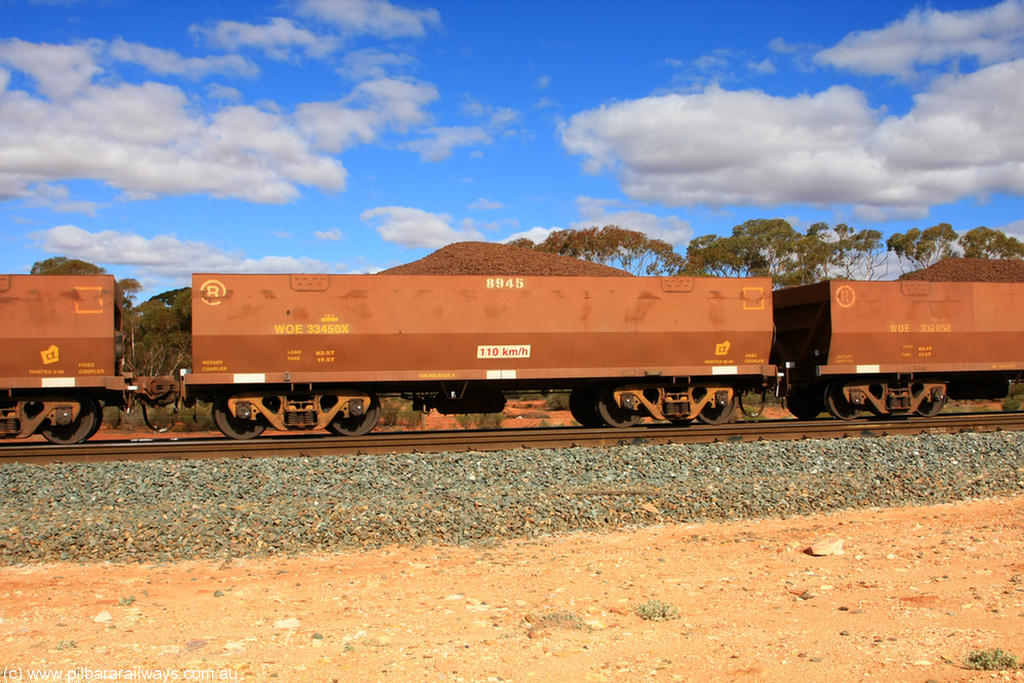 100731 02856
WOE type iron ore waggon WOE 33450 is one of a batch of seventeen built by United Group Rail WA between July and August 2008 with serial number 950209-014 and fleet number 8945 for Koolyanobbing iron ore operations, on loaded train 7415 at Binduli Triangle, 31st July 2010.
Keywords: WOE-type;WOE33450;United-Group-Rail-WA;950209-014;