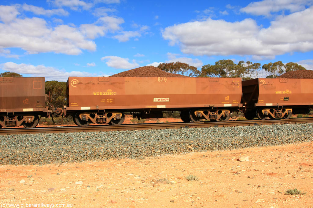 100731 02859
WOE type iron ore waggon WOE 33380 is one of a batch of one hundred and forty one built by United Group Rail WA between November 2005 and April 2006 with serial number 950142-085 and fleet number 879 for Koolyanobbing iron ore operations, with PORTMAN painted out and load revised down to 82.5 tonnes, on loaded train 7415 at Binduli Triangle, 31st July 2010.
Keywords: WOE-type;WOE33380;United-Group-Rail-WA;950142-085;
