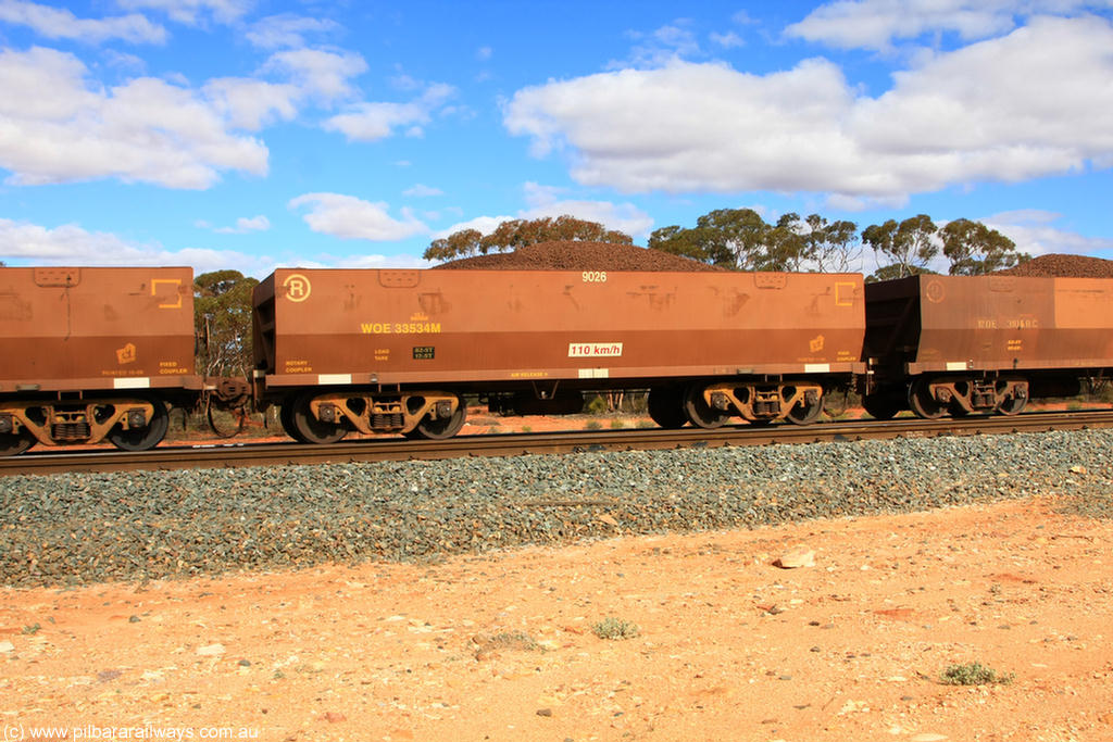 100731 02866
WOE type iron ore waggon WOE 33534 is one of a batch of one hundred and twenty eight built by United Group Rail WA between August 2008 and March 2009 with serial number 950211-074 and fleet number 9026 for Koolyanobbing iron ore operations, on loaded train 7415 at Binduli Triangle, 31st July 2010.
Keywords: WOE-type;WOE33534;United-Group-Rail-WA;950211-074;