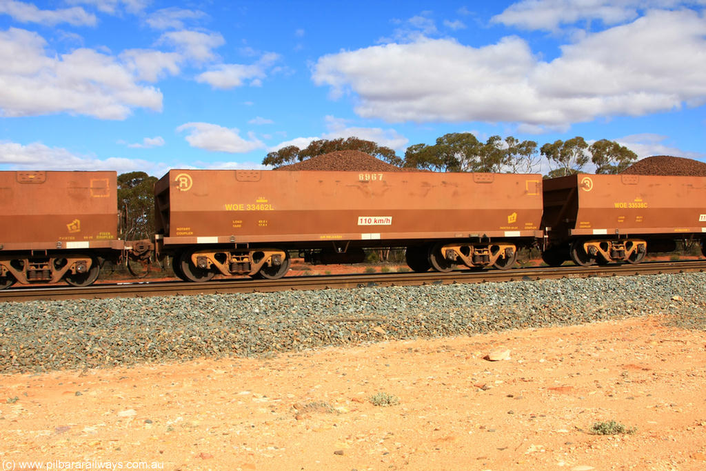 100731 02869
WOE type iron ore waggon WOE 33462 is one of a batch of one hundred and twenty eight built by United Group Rail WA between August 2008 and March 2009 with serial number 950211-004 and fleet number 8967 for Koolyanobbing iron ore operations, on loaded train 7415 at Binduli Triangle, 31st July 2010.
Keywords: WOE-type;WOE33462;United-Group-Rail-WA;950211-004;
