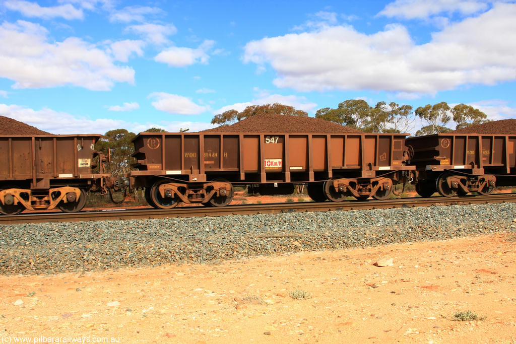 100731 02883
WOD type iron ore waggon WOD 31484 is one of a batch of sixty two built by Goninan WA between April and August 2000 with serial number 950086-056 and fleet number 547 for Koolyanobbing iron ore operations with a 75 ton capacity build date 07/2000, for Portman Mining to cart their Koolyanobbing iron ore to Esperance, now with PORTMAN painted out, on loaded train 7415 at Binduli Triangle, 31st July 2010.
Keywords: WOD-type;WOD31484;Goninan-WA;950086-056;