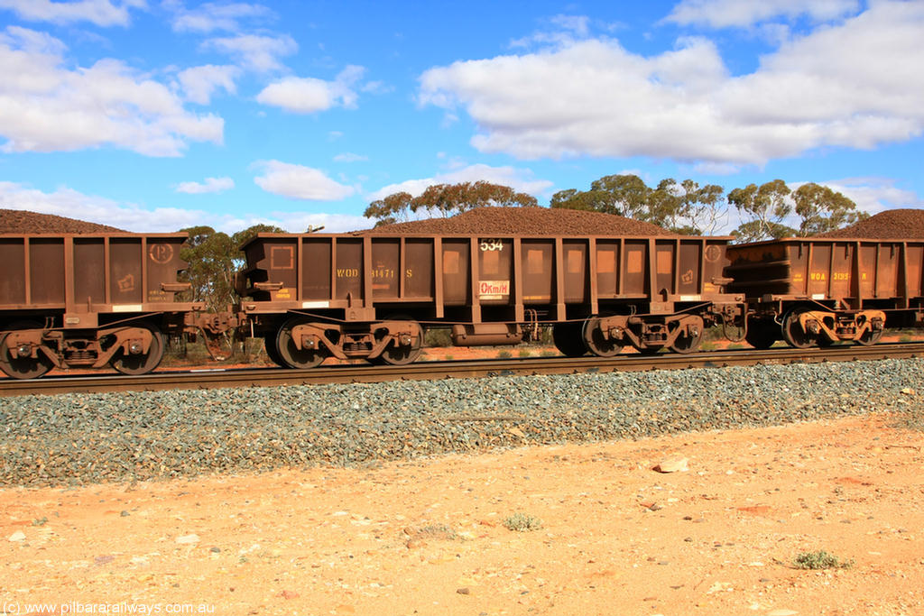 100731 02889
WOD type iron ore waggon WOD 31471 is one of a batch of sixty two built by Goninan WA between April and August 2000 with serial number 950086-043 and fleet number 534 for Koolyanobbing iron ore operations with a 75 ton capacity for Portman Mining to cart their Koolyanobbing iron ore to Esperance, now with PORTMAN painted out, on loaded train 7415 at Binduli Triangle, 31st July 2010.
Keywords: WOD-type;WOD31471;Goninan-WA;950086-043;