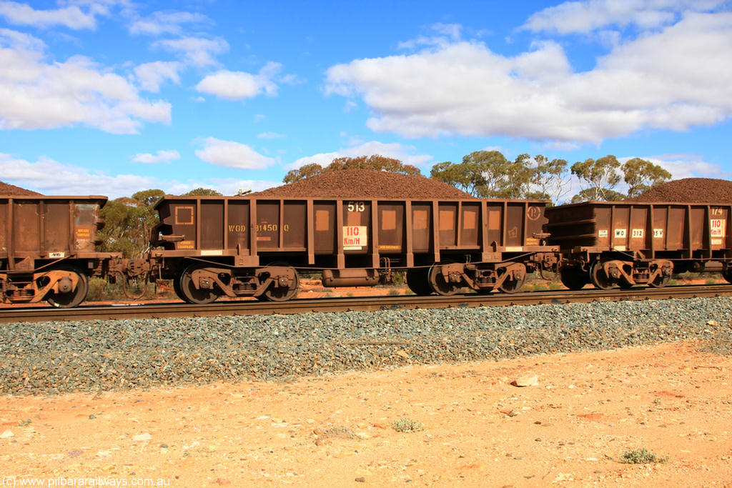 100731 02892
WOD type iron ore waggon WOD 31450 is one of a batch of sixty two built by Goninan WA between April and August 2000 with serial number 950086-022 and fleet number 513 for Koolyanobbing iron ore operations with a 75 ton capacity for Portman Mining to cart their Koolyanobbing iron ore to Esperance, now with PORTMAN painted out, on loaded train 7415 at Binduli Triangle, 31st July 2010.
Keywords: WOD-type;WOD31450;Goninan-WA;950086-022;