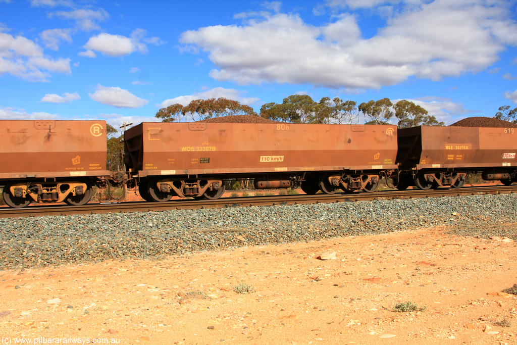 100731 02906
WOE type iron ore waggon WOE 33307 is one of a batch of one hundred and forty one built by United Goninan WA between November 2005 and April 2006 with serial number 950142-012 and fleet number 806 for Koolyanobbing iron ore operations, on loaded train 7415 at Binduli Triangle, 31st July 2010.
Keywords: WOE-type;WOE33307;United-Goninan-WA;950142-012;