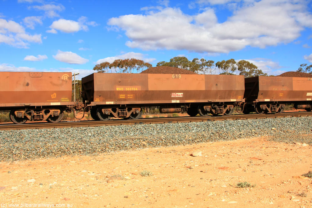 100731 02907
WOE type iron ore waggon WOE 30276 is one of a batch of one hundred and thirty built by Goninan WA between March and August 2001 with serial number 950092-026 and fleet number 619 for Koolyanobbing iron ore operations, on loaded train 7415 at Binduli Triangle, 31st July 2010.
Keywords: WOE-type;WOE30276;Goninan-WA;950092-026;