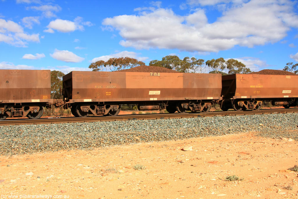 100731 02908
WOE type iron ore waggon WOE 31122 is one of a batch of one hundred and thirty built by Goninan WA between March and August 2001 with serial number 950092-112 and fleet number 704 for Koolyanobbing iron ore operations, on loaded train 7415 at Binduli Triangle, 31st July 2010.
Keywords: WOE-type;WOE31122;Goninan-WA;950092-112;