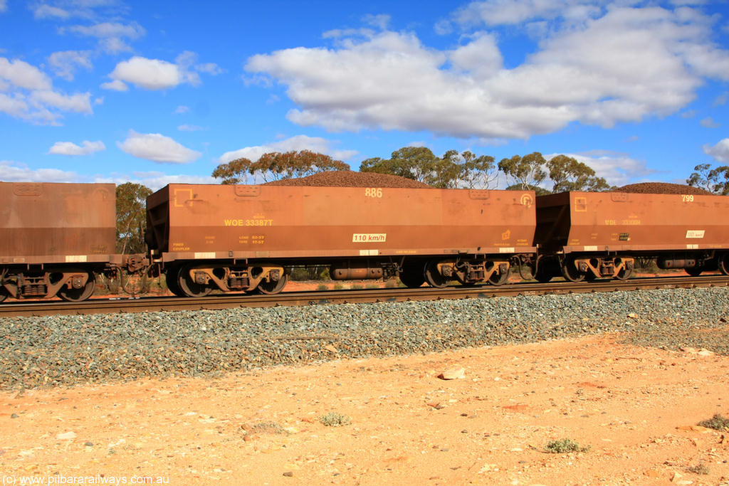 100731 02909
WOE type iron ore waggon WOE 33387 is one of a batch of one hundred and forty one built by United Group Rail WA between November 2005 and April 2006 with serial number 950142-092 and fleet number 886 for Koolyanobbing iron ore operations, on loaded train 7415 at Binduli Triangle, 31st July 2010.
Keywords: WOE-type;WOE33387;United-Group-Rail-WA;950142-092;