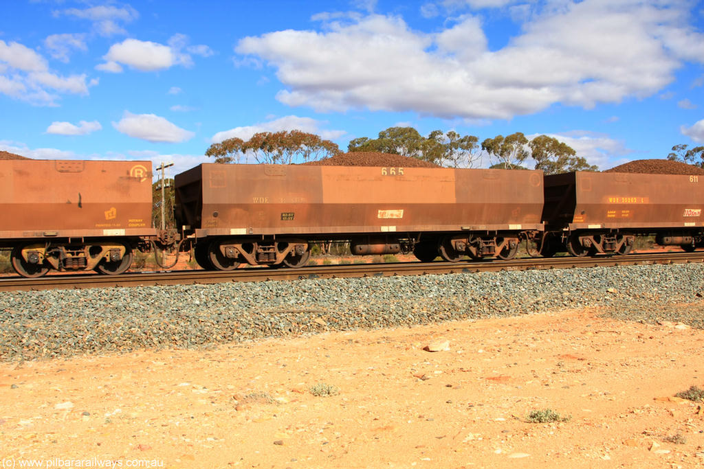 100731 02911
WOE type iron ore waggon WOE 31080 is one of a batch of one hundred and thirty built by Goninan WA between March and August 2001 with serial number 950092-070 and fleet number 665 for Koolyanobbing iron ore operations, on loaded train 7415 at Binduli Triangle, 31st July 2010.
Keywords: WOE-type;WOE31080;Goninan-WA;950092-070;