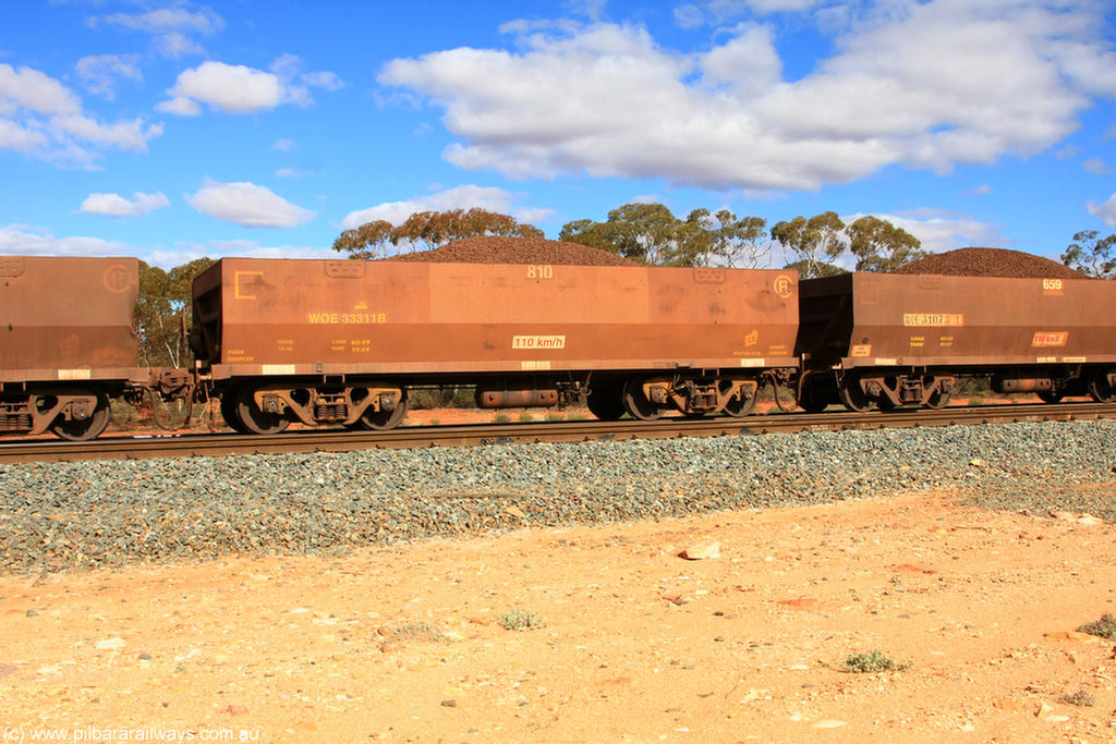100731 02914
WOE type iron ore waggon WOE 33311 is one of a batch of one hundred and forty one built by United Goninan WA between November 2005 and April 2006 with serial number 950142-016 and fleet number 810 for Koolyanobbing iron ore operations, on loaded train 7415 at Binduli Triangle, 31st July 2010.
Keywords: WOE-type;WOE33311;United-Goninan-WA;950142-016;