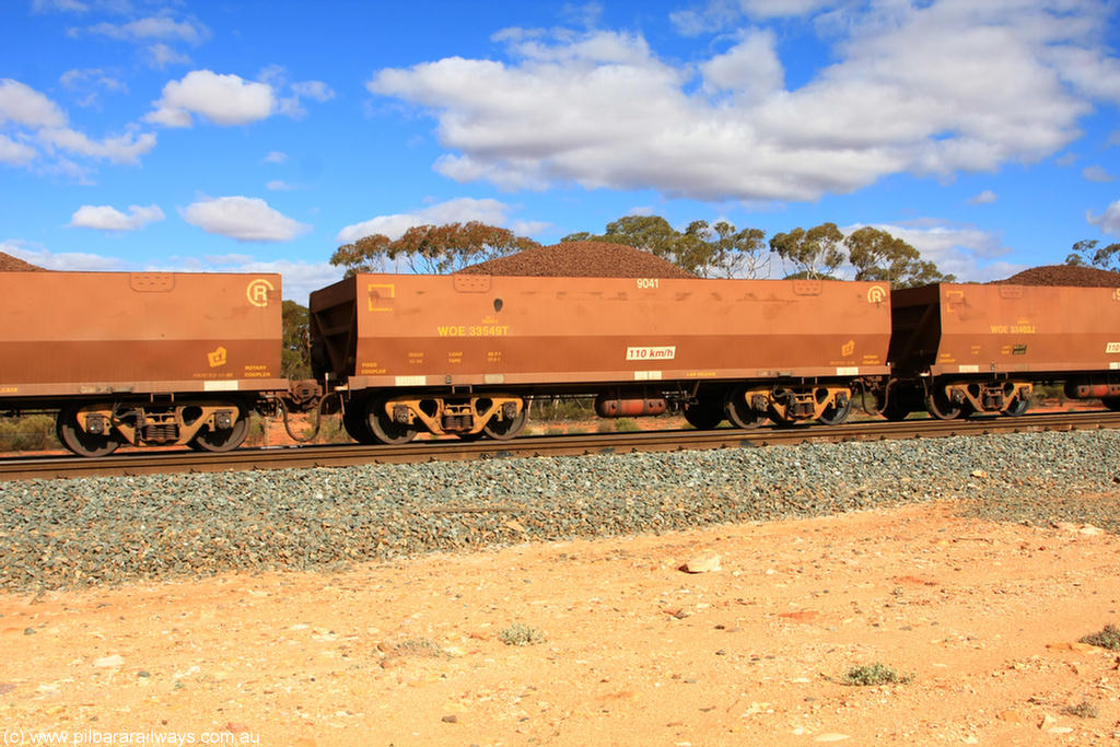 100731 02921
WOE type iron ore waggon WOE 33549 is one of a batch of one hundred and twenty eight built by United Group Rail WA between August 2008 and March 2009 with serial number 950211-089 and fleet number 9041 for Koolyanobbing iron ore operations, on loaded train 7415 at Binduli Triangle, 31st July 2010.
Keywords: WOE-type;WOE33549;United-Group-Rail-WA;950211-089;