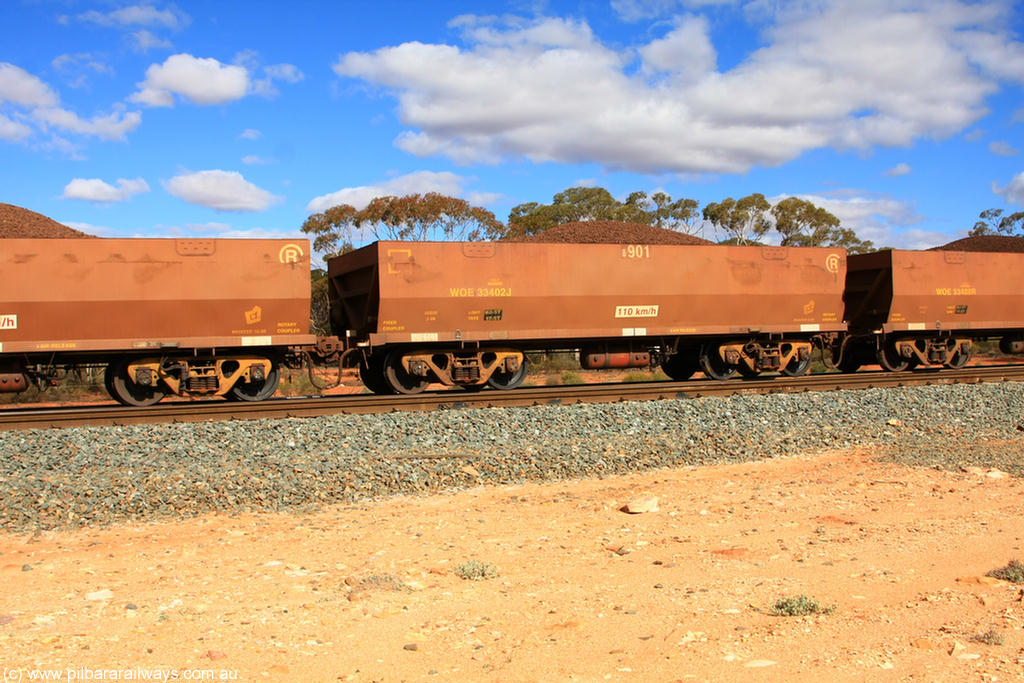 100731 02922
WOE type iron ore waggon WOE 33402 is one of a batch of one hundred and forty one built by United Group Rail WA between November 2005 and April 2006 with serial number 950142-107 and fleet number 8901 for Koolyanobbing iron ore operations, on loaded train 7415 at Binduli Triangle, 31st July 2010.
Keywords: WOE-type;WOE33402;United-Group-Rail-WA;950142-107;